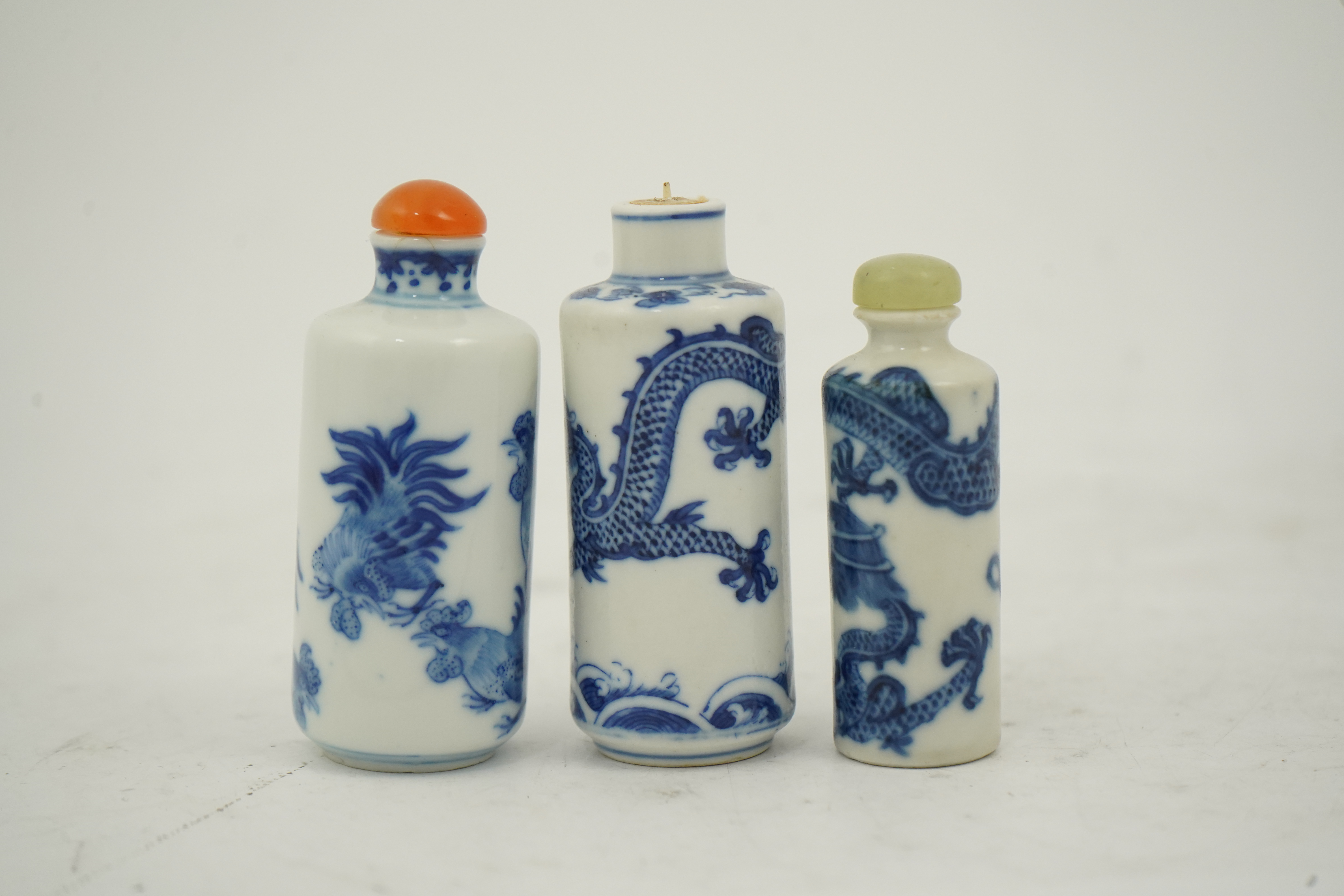 Three Chinese blue and white snuff bottles, c.1850-1900